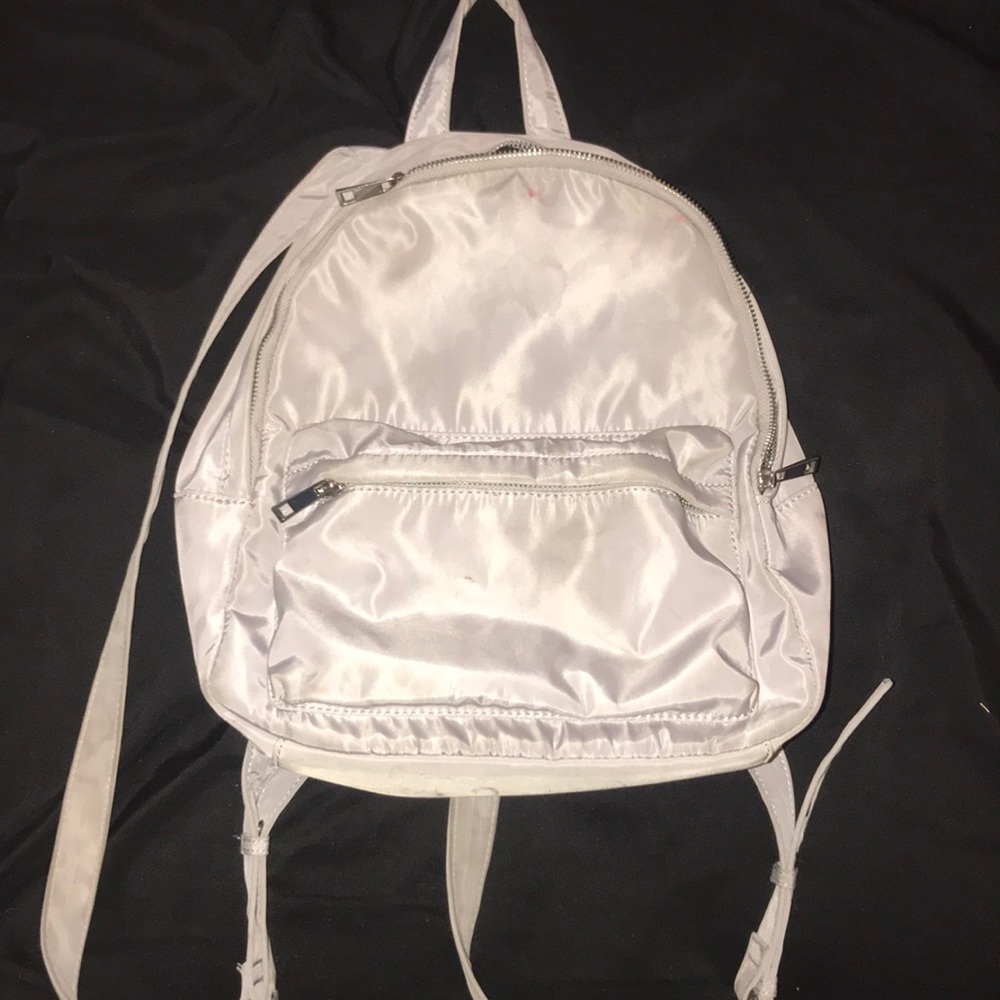 silver/grey backpack